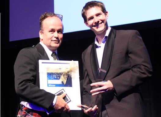 Professor John Fraser and Dr Dylan Flaws with his award