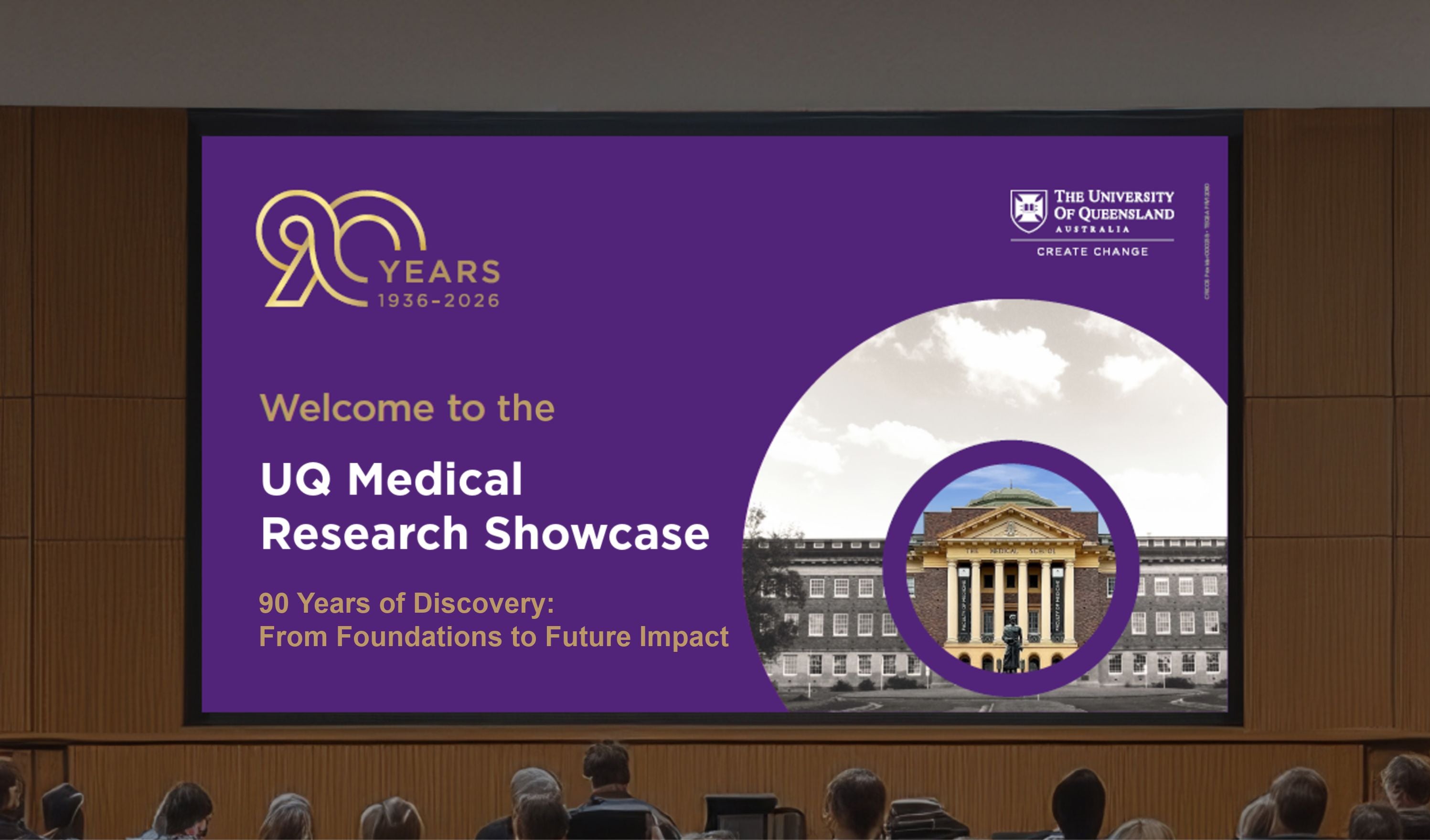 UQ Medical Research Showcase slide celebrating 90 years of discovery, displayed on an auditorium screen.