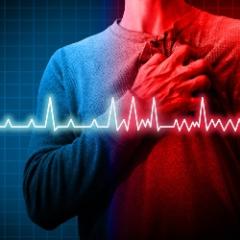 Man clutching heart