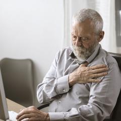 Man with hand on heart