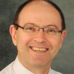 Dr Charles Denaro